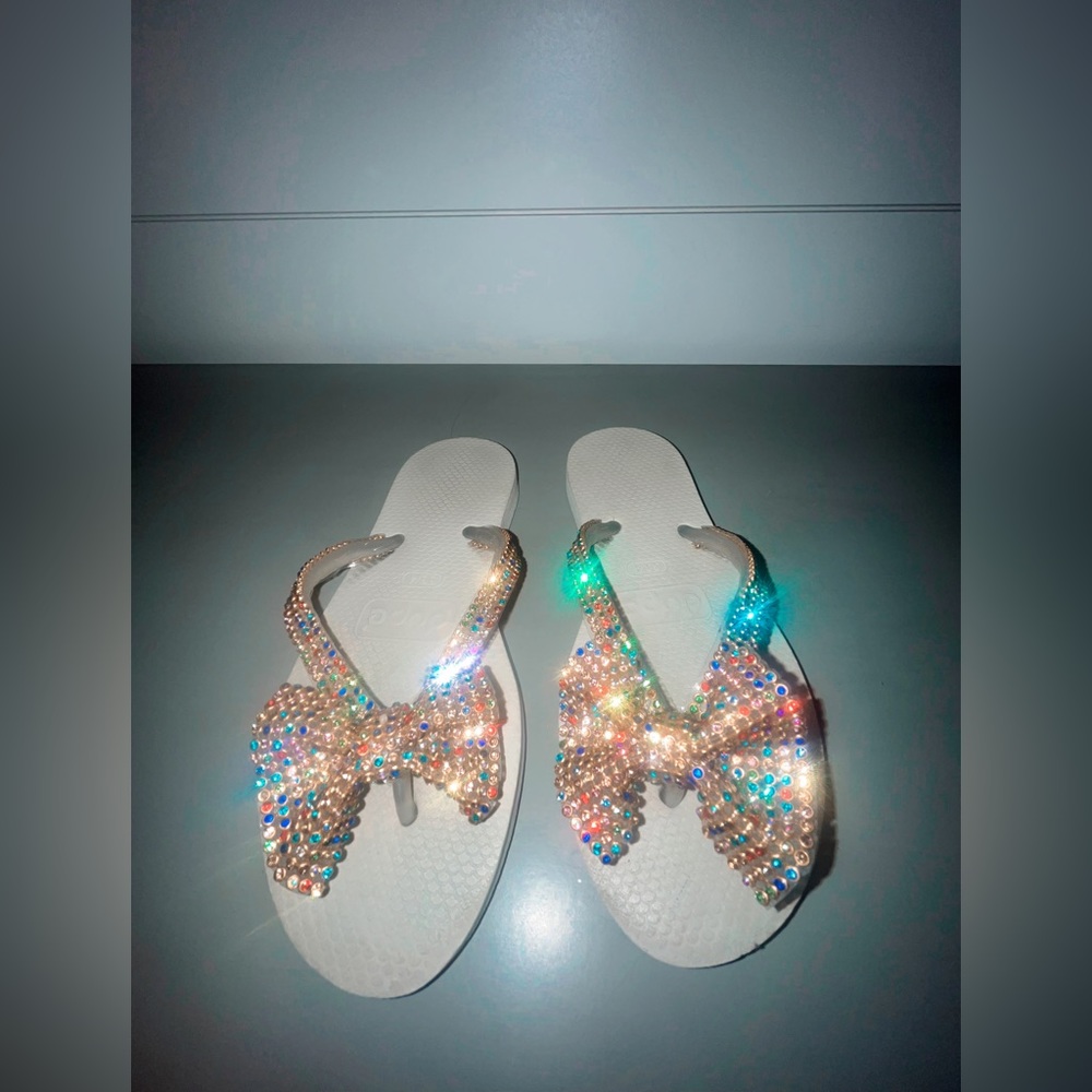 multi-colored bedazzled bow sandals